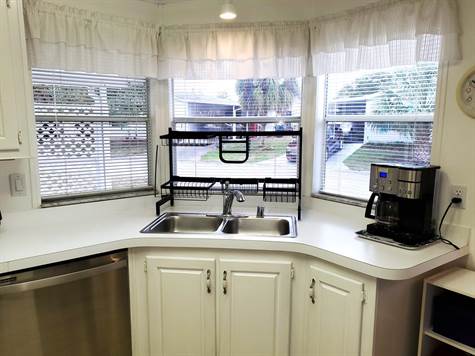 DOUBLE SINK WITH BEAUTIFUL WINDOWS