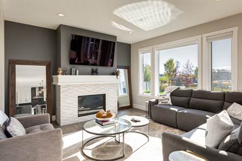 The living room features a gas fireplace.