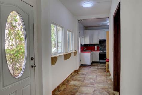 Enclose access to patio and utility kitchen 