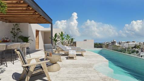 PENTHOUSE WITH OCEAN VIEW FOR SALE IN PLAYA DEL CARMEN SWIMMING POOL