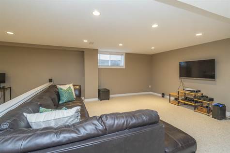 Fully Finished Basement fts a Great Size Rec Room & Plenty of Storage