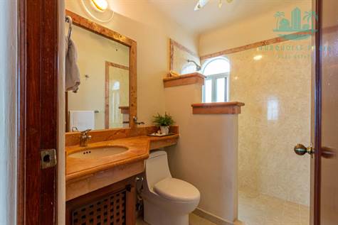 full guest bathroom in Playa Kaan penthouse for sale