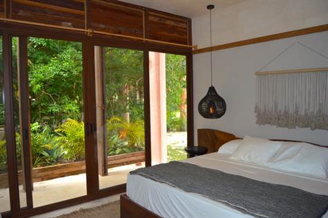 Cozumel Real Estate Exceptional Flat with large terrace inside Country Club for Sale in Cozumel