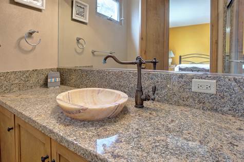 Marble and granite vanity in both bathrooms