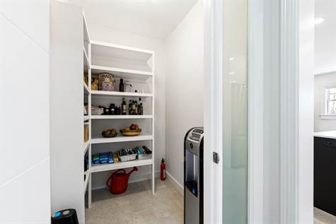 The convenient pantry is perfect for extra storage