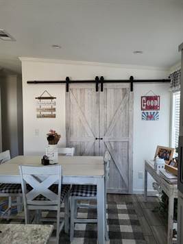 Dining/privacy doors to den