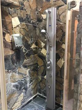 Shower with natural stone