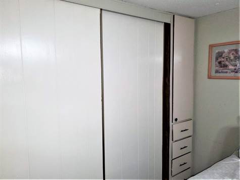 WALL CLOSET AND BUILT-IN DRAWERS AND CABINET