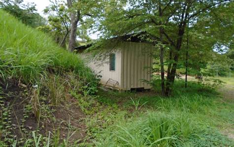 Comes with an 8 x 40 container that could be converted to a rental cabin, caretaker's suite or garage.