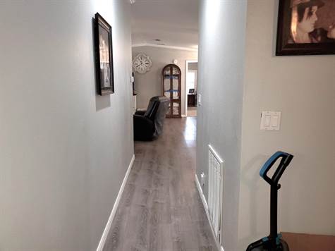 HALLWAY FROM THE FAMILY ROOM TO THE LIVING ROOM