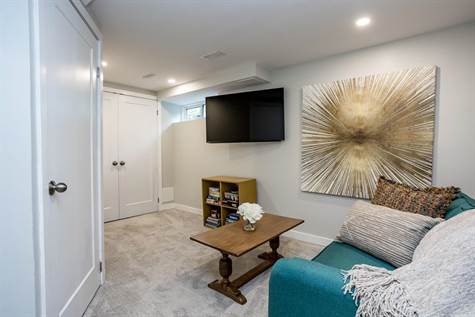 Family Room in Basement (2020) is a Great Added Space & features New Carpet & Pot lights