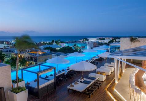 Playa del Carmen Real Estate- Splendorous condo hotel Loft for sale at The Fives downtown Playa del Carmen