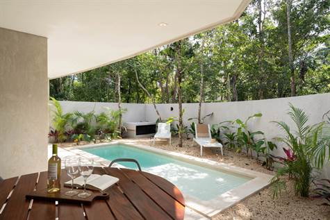 "Tree Tops" Spacious Condo Hotel for Sale in Aldea Maya