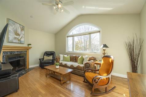 Unique 2ND Level Family Room w/Cathedral Ceilings, Beautiful Large Window & Wood Fireplace
