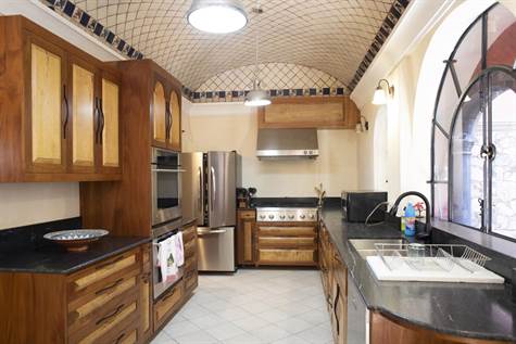 Remodeled kitchen with tile ceiling