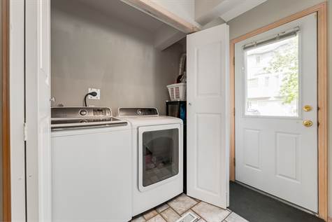 The washer and dryer are by the kitchen on the main floor.