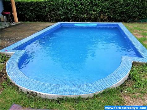 refreshing tiled concrete pool