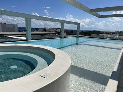 1Br. Condo steps from the beach in the premium area of Playa del Carmen 