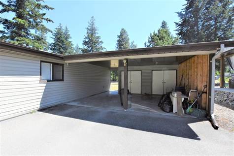 Double Carport with storage behind 