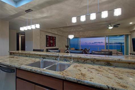 Fully equipped kitchen which also looks towards the ocean