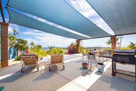 Huge outdoor living area Custom shade panels. 1805ft2 terrace. Alfresco dining and BBQ