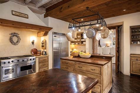 Gourmet kitchen with mesquite countertops and Viking appliances