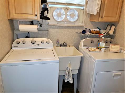 WHIRLPOOL WASHER AND DRYER WITH A UTILITY SINK