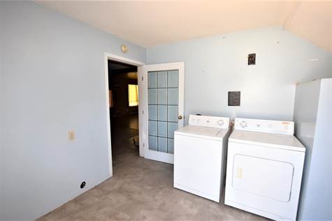 step inside to a large mud room/laundry room 