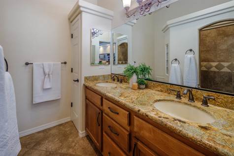 Bath with walk-in tile shower