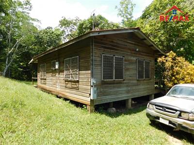 (#2069) - ONE BEDROOM HOUSE WITH 8 ACRES OF LAND WITH A CREEK NEAR CRISTO REY VILAGE, CAYO DISTRICT.