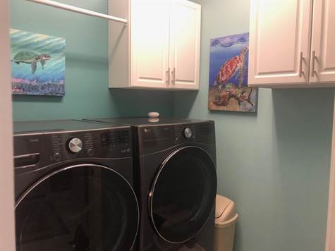 Laundry w/cabinet storage