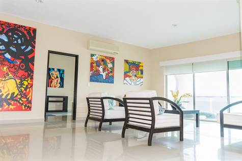OCEANFRONT new penthouse for sale in PUERTO MORELOS SOFA VIEW