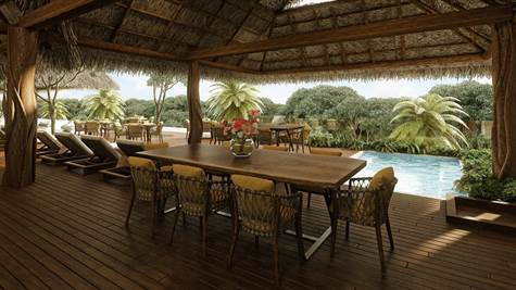 NEW APARTMENTS FOR SALE IN TULUM dining table by the pool