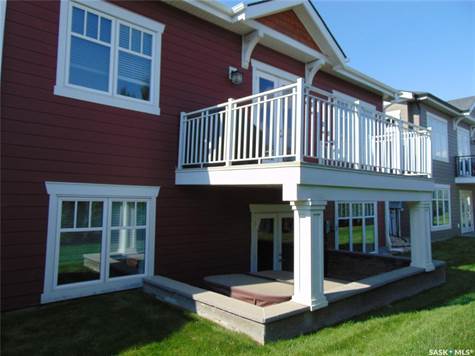 Rear view showing deck and hot tub area