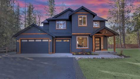 3 car garage with frosted windows in the garage doors.  Electric openers on all doors.