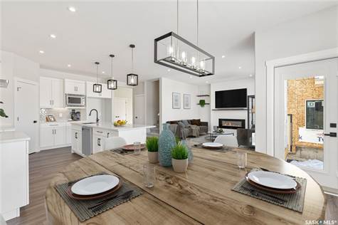 View dining to kitchen (virtually staged)