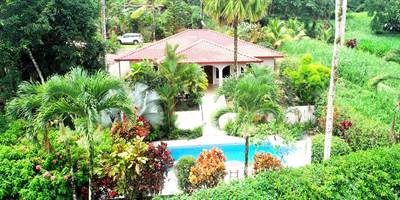 Turnkey Spacious Home with Open Layout, Pool & Small Ocean View in Ojochal Gated Community