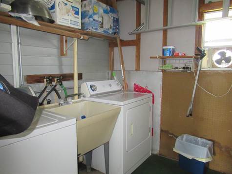 Washer and dryer in shed