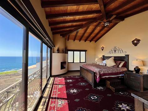 primary bedroom suite with an oversized balcony 