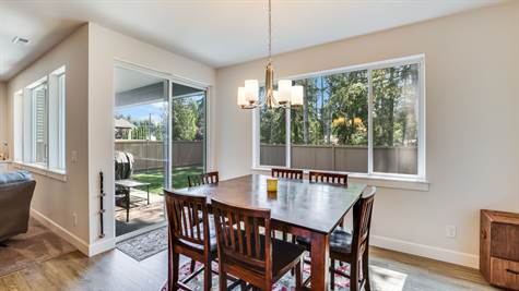 Dining area - convenient to the kitchen and patio for summertime barbecues.