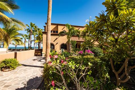Casa La Playa is surrounded by flowering gardens