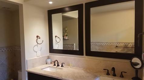 Master bathroom has double vanity