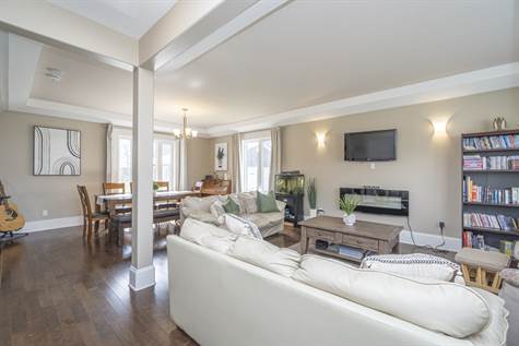 Living Room Features Engineered Hardwood Floors throughout