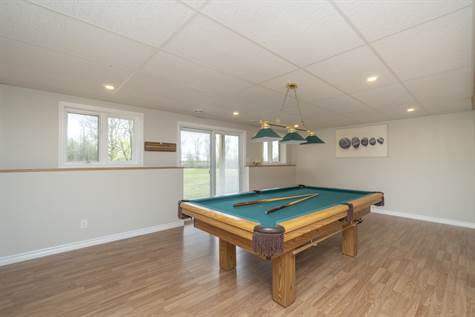 Finished Basement features a Fam Rm w/Laminate Floors & WALK OUT to Your Backyard!