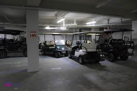 Ground floor: 2 golf cart charging area & parking