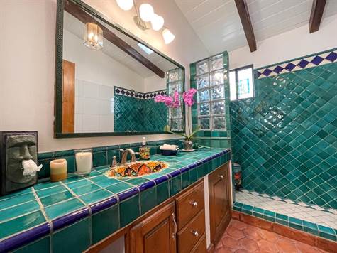 Second bathroom with tile ornaments
