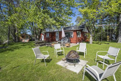 3 Season Cedar Cottage w/Open Ceilings located in Carleton Place. Just a 30 minute drive to Kanata