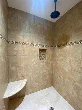 Tiled corner walk in shower