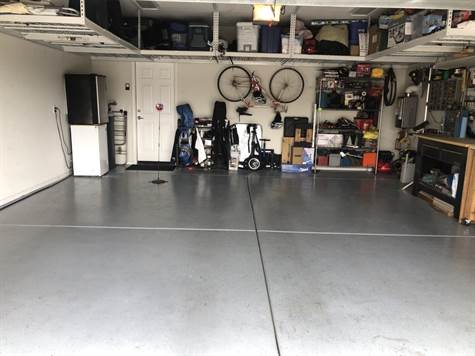 Extended Garage w/epoxy flooring & Storage Racks