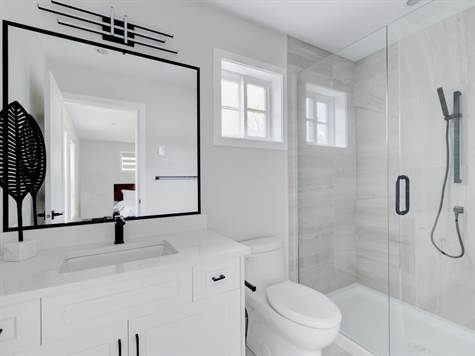MASTER BATHROOM WITH WALK-IN GLASS SHOWER